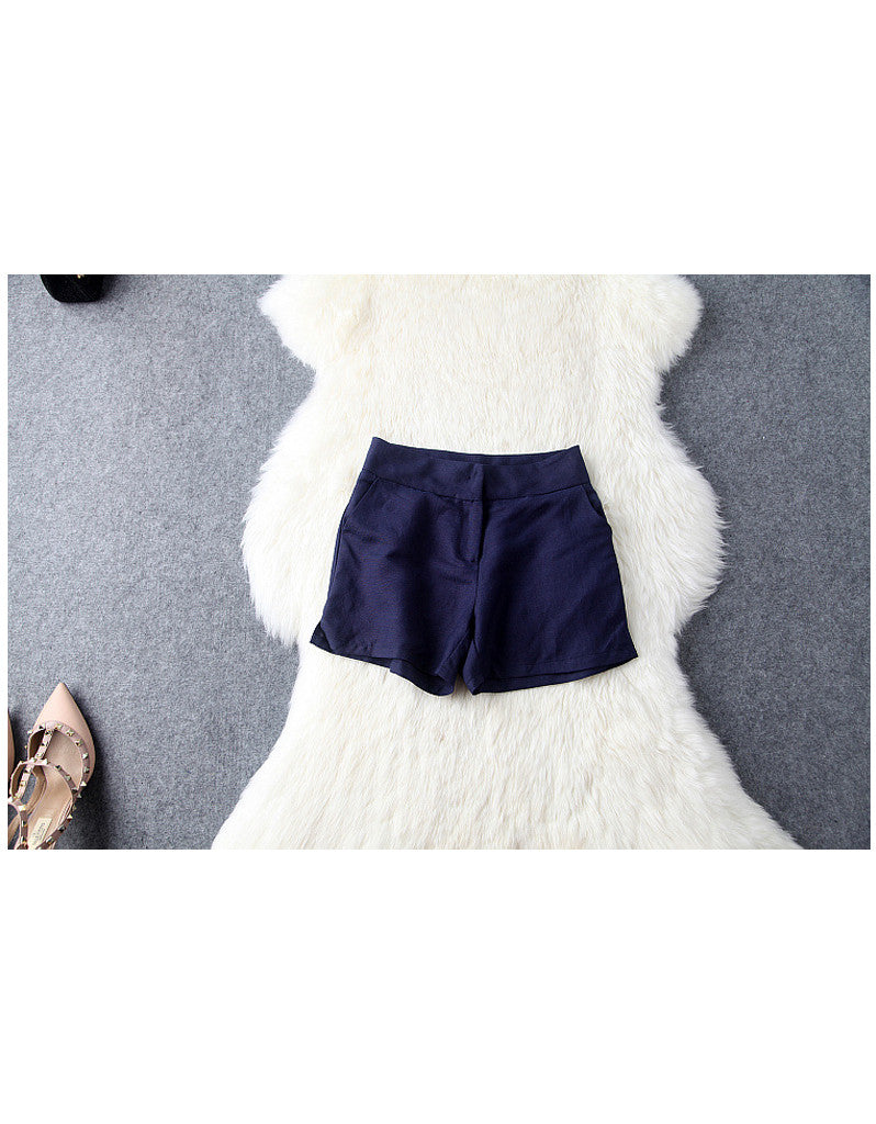 Sleeveless V-neck top with spaghetti top and shorts