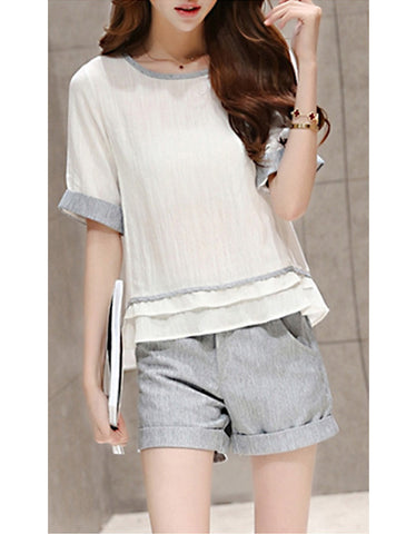Sleeveless V-neck top with spaghetti top and shorts