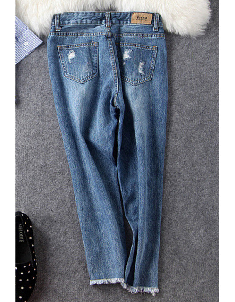 Distressed jeans with birdie design in sequins, beads and embroidery