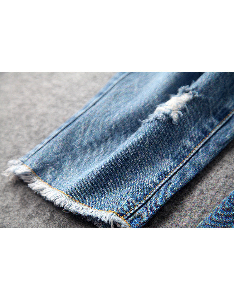 Distressed jeans with birdie design in sequins, beads and embroidery