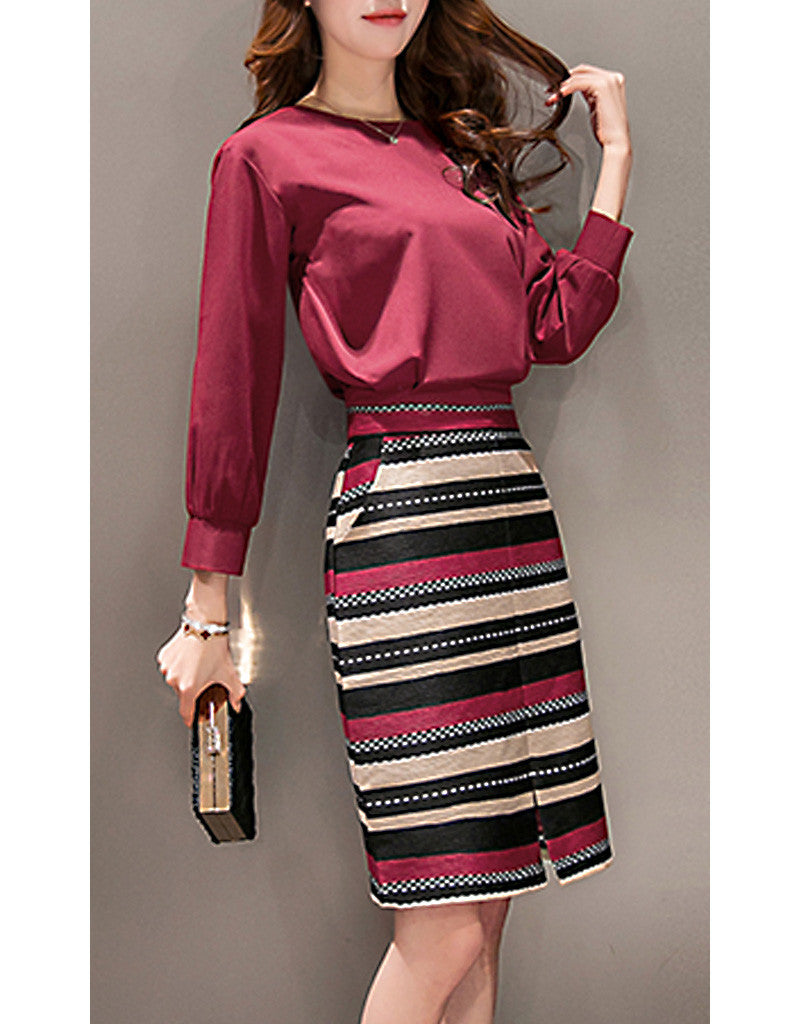 Long sleeve top with mid-length multi-coloured skirt