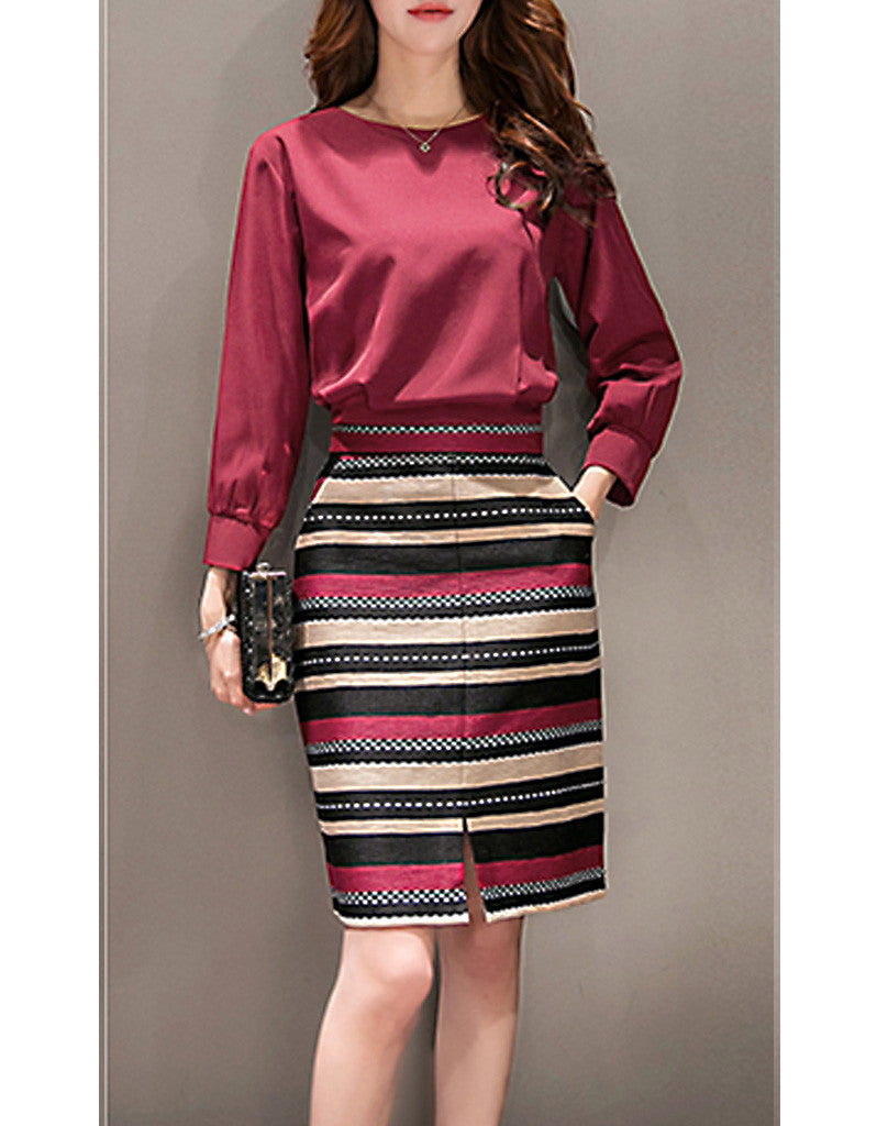 Long sleeve top with mid-length multi-coloured skirt