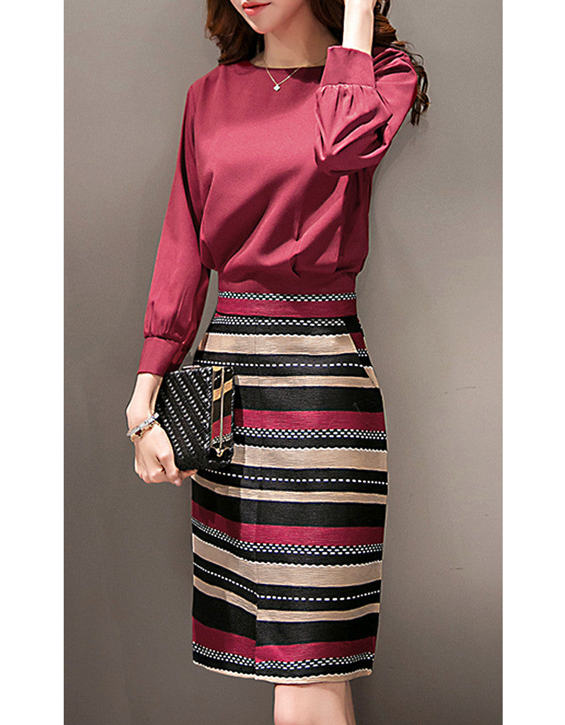 Long sleeve top with mid-length multi-coloured skirt