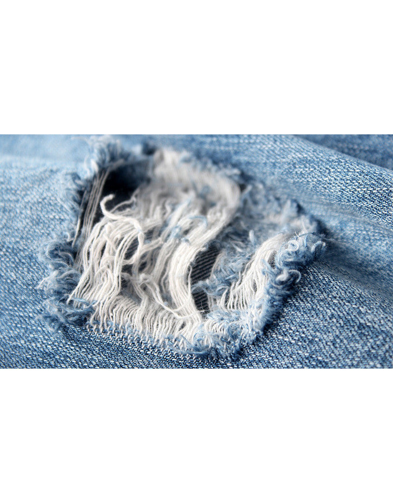 Distressed jeans with birdie design in sequins, beads and embroidery