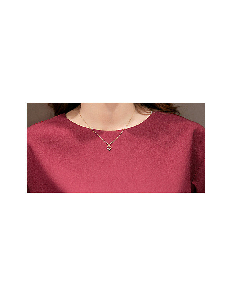 Long sleeve top with mid-length multi-coloured skirt