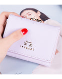 3-fold PU leather wallet with gold-embossed animal print (more colours)