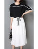 Monochrome mid-length sleeve top with pleated skirt