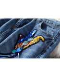 Distressed jeans with birdie design in sequins, beads and embroidery