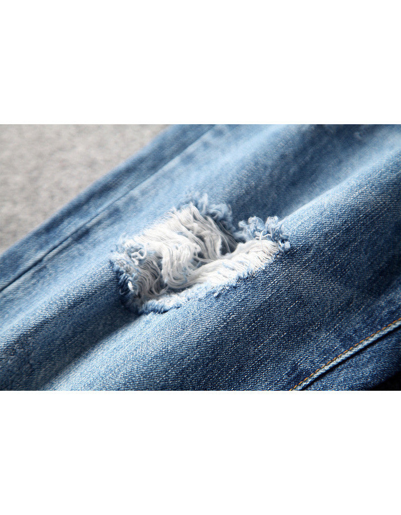 Distressed jeans with birdie design in sequins, beads and embroidery