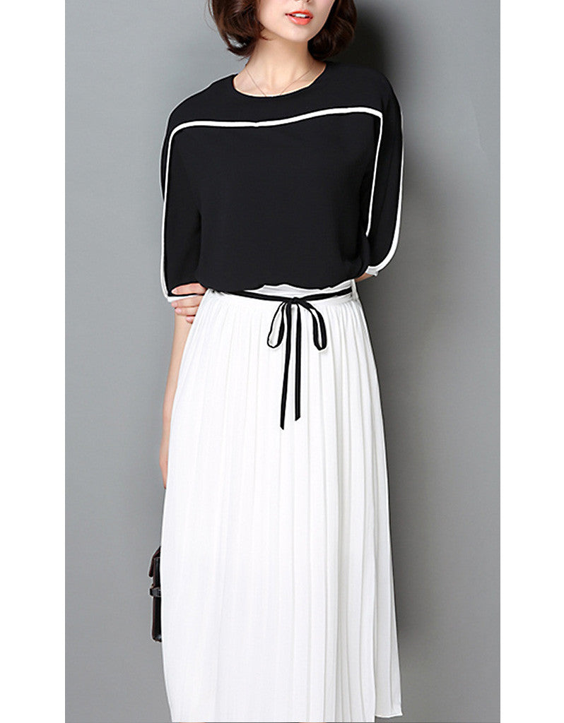 Monochrome mid-length sleeve top with pleated skirt