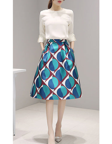 Long sleeve top with mid-length multi-coloured skirt