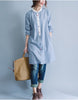 Oversized long sleeved striped shirt dress with multi-coloured buttons