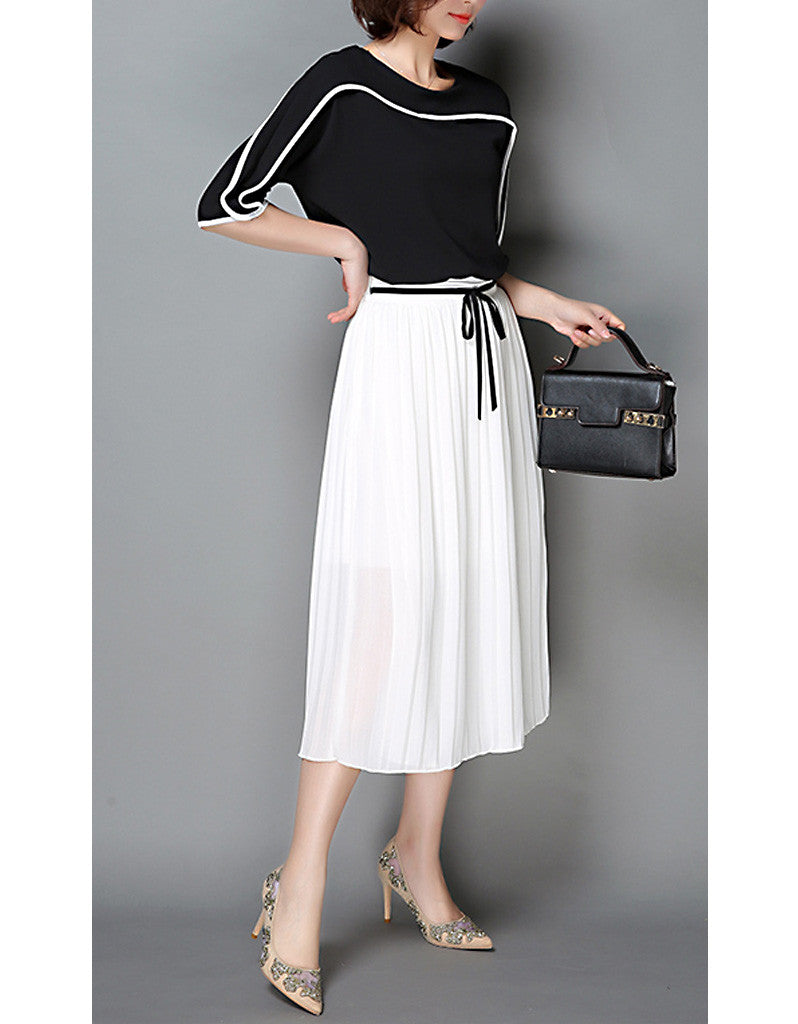 Monochrome mid-length sleeve top with pleated skirt