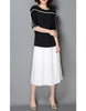 Monochrome mid-length sleeve top with pleated skirt